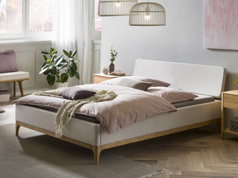 HASENA - Lit capitonné, pieds en chêne massif