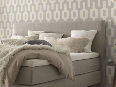 HASENA - Zoom sur la tête de lit du lit Costa boxspring