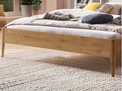 Lit Pienza en chêne noueux massif haut de gamme de notre collection LOUNGE